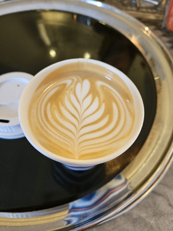 Cambridge Union出来是一家咖啡店，点了flat white小姐姐很可爱，拉花很漂亮消费£3.4Cambridge Union出来是一家咖啡店，点了flat white小姐姐很可爱，拉花很漂亮消费£3.4